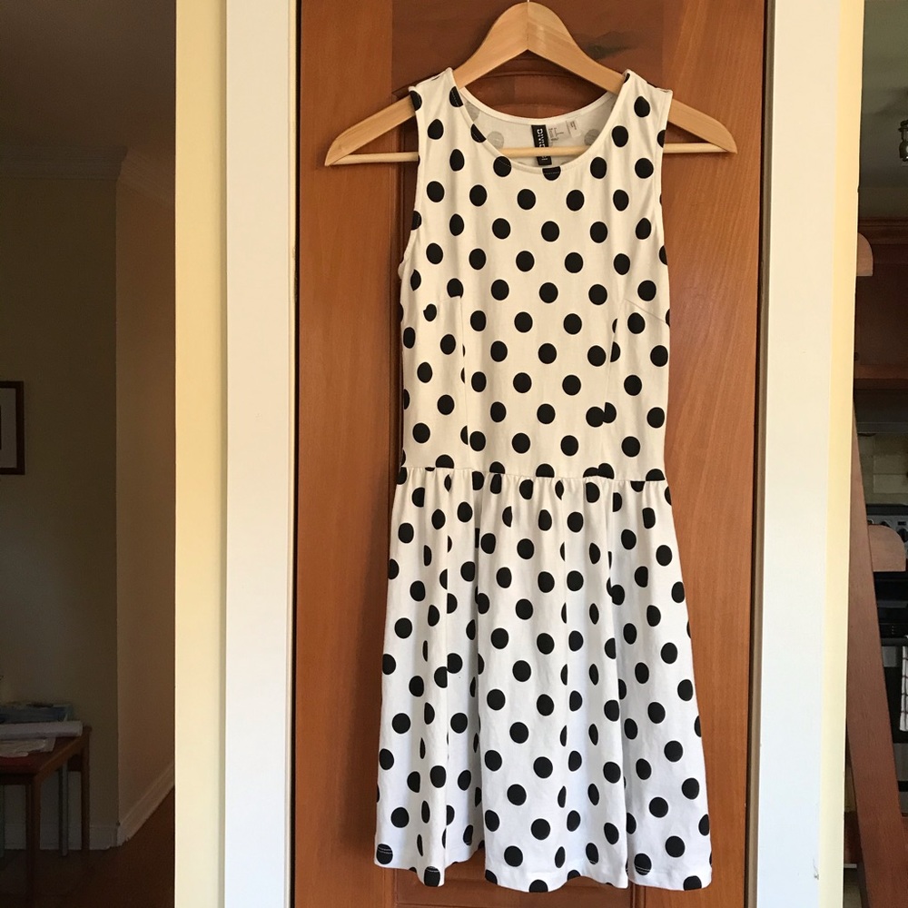 Sleeveless polkadot flare skater dress in white